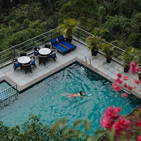 Hotel The Panoramic Getaway Munnar Exterior foto The swimming pool at the hotel