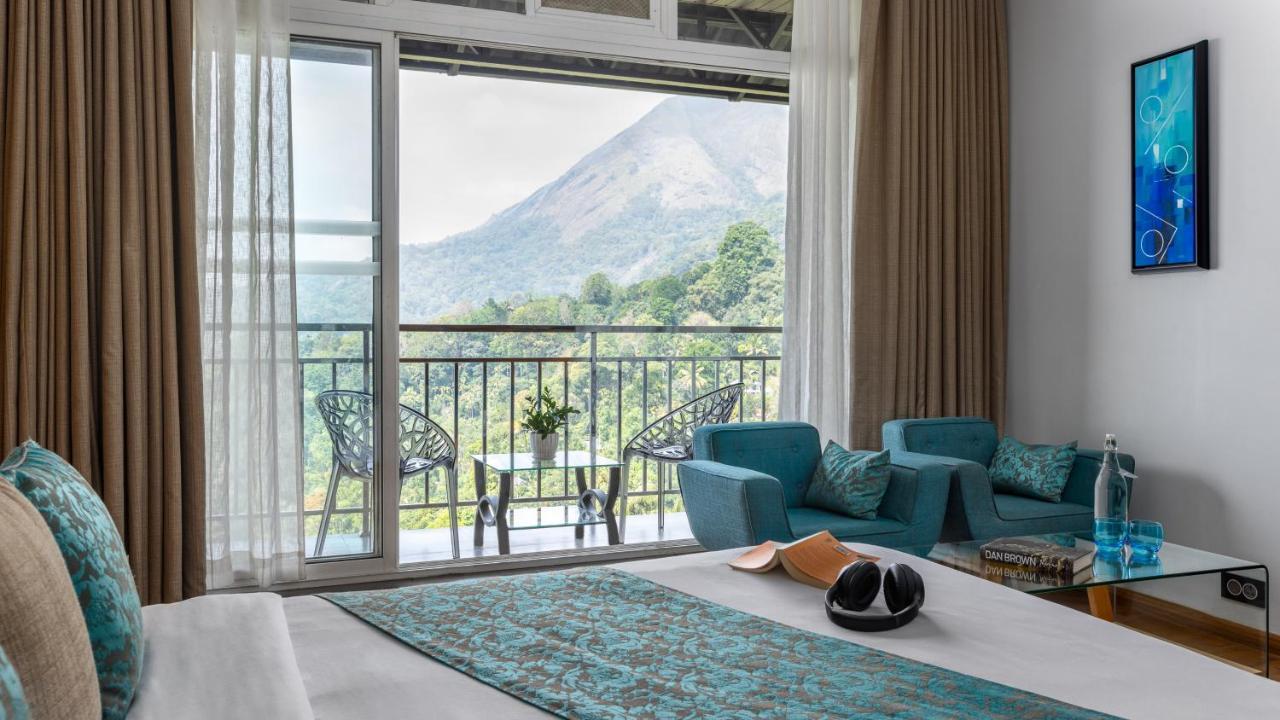 Hotel The Panoramic Getaway Munnar Exterior foto View of Mount Apo from the hotel