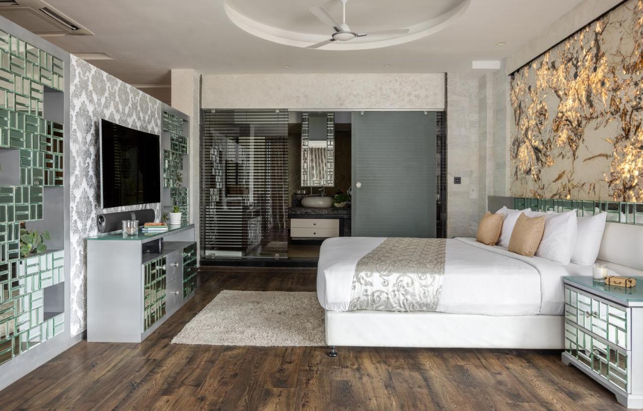 Hotel The Panoramic Getaway Munnar Exterior foto A bedroom at the hotel