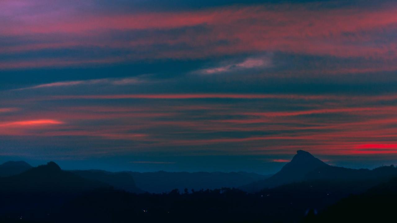 Hotel The Panoramic Getaway Munnar Exterior foto Sunset over the Sierra de los Caracoles
