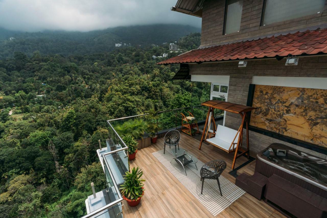 Hotel The Panoramic Getaway Munnar Exterior foto A view from the balcony of a house in Kerala, India